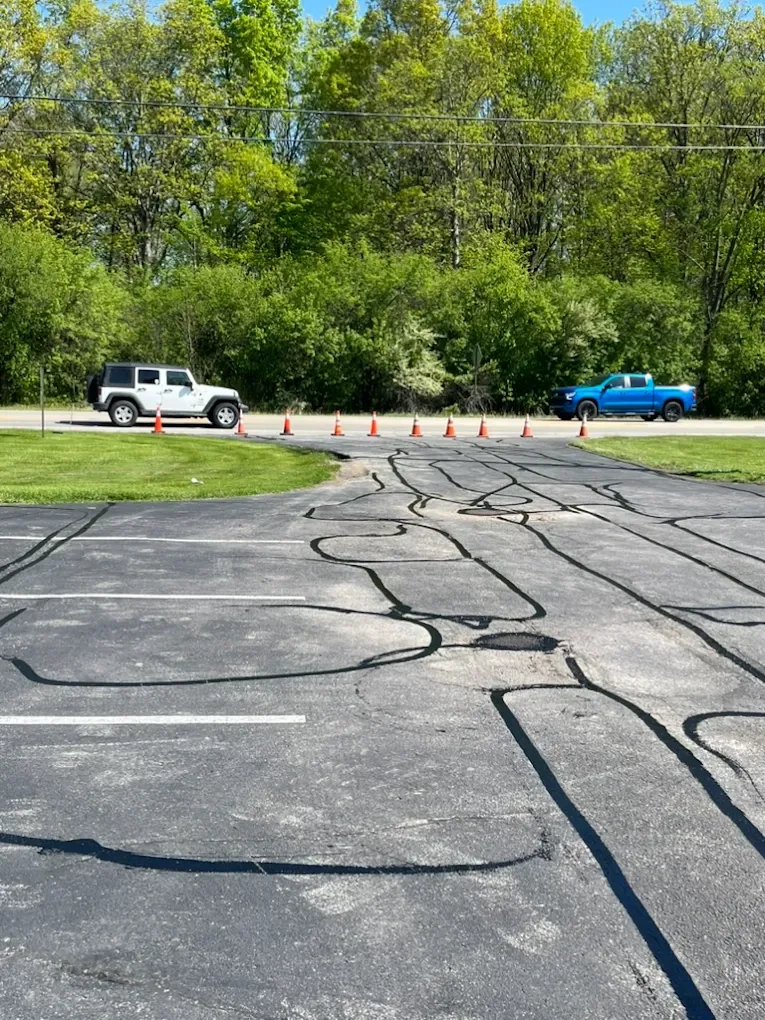 Hot rubber crack sealing